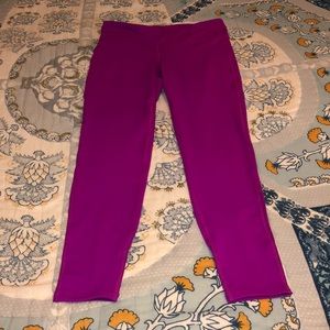 Pink/purple leggings with mesh at the bottom